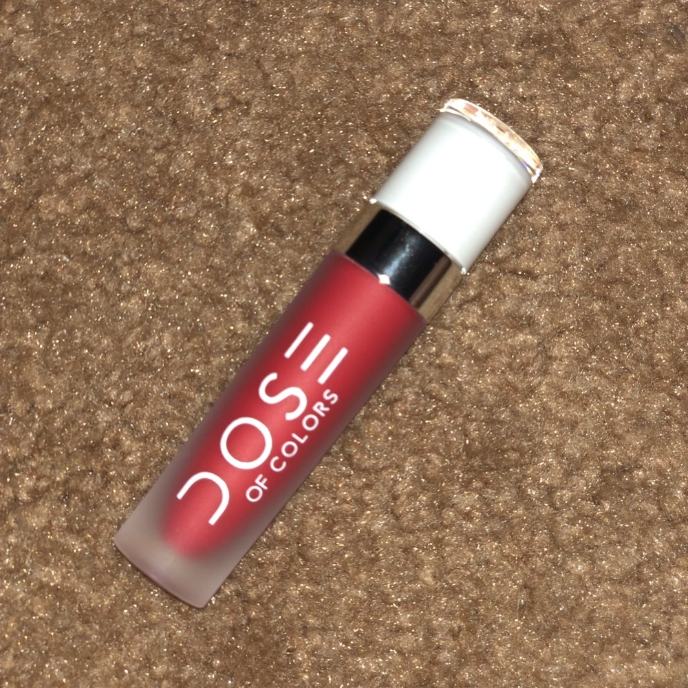 Coral red lipstick